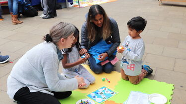 MRC Festival:group of children trying out an activity
