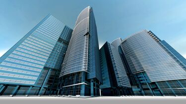 A photo of a large glass fronted building.