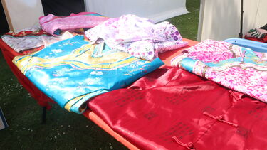 Chinese costumes on the stall