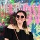 Lauren in front of some street art