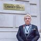 Previous student in front of the Cabinet Office