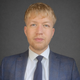Student Brogan Horniman in a suit